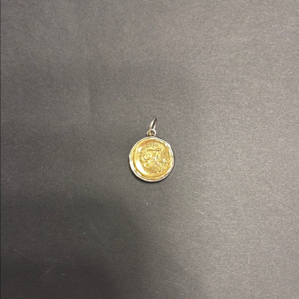 Waxing Poetic Round Insignia “F”
